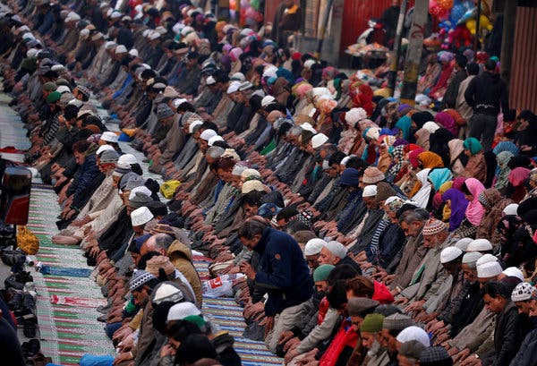 Muslims praying at the shrine of a Sufi saint on Wednesday in Srinagar, Kashmir.